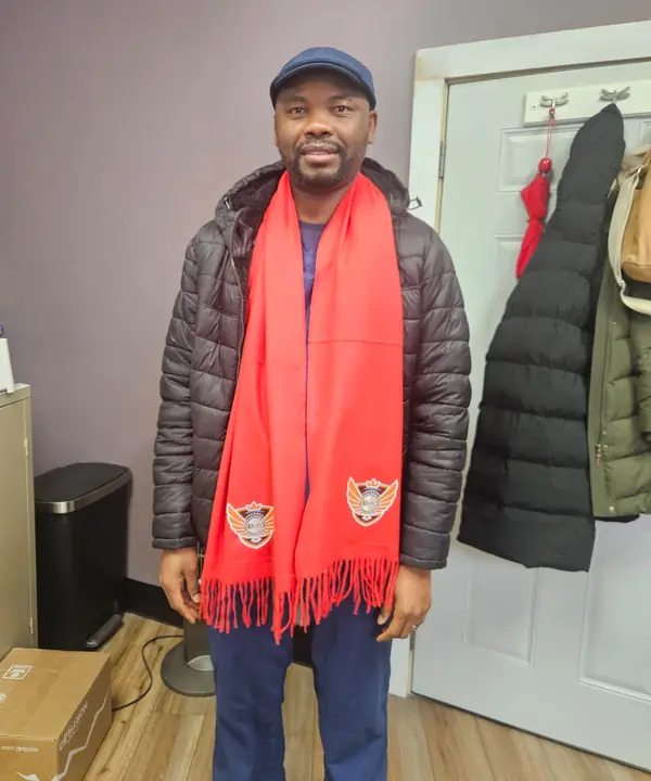 Member wearing a red CAVFC club scarf