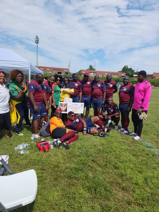 CAVFC players and supporters with the club sign at NVT 2023, hosted by Gwinnett Veterans SC