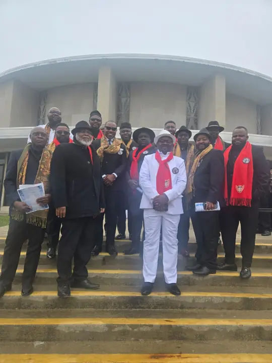 CAVFC members in formal attire with club scarves