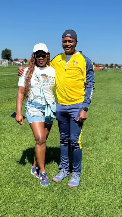 Supporter and member in a yellow club jacket on the tournament field
